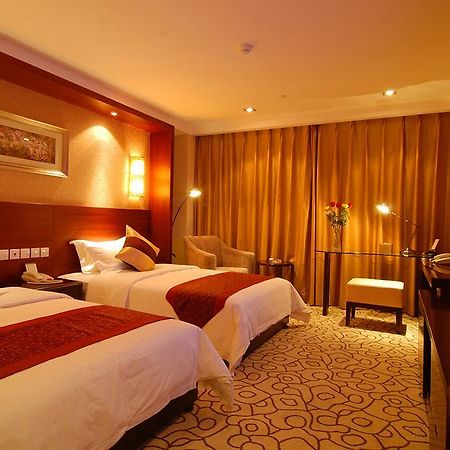 Dynasty International Hotel Kunming Oda fotoğraf