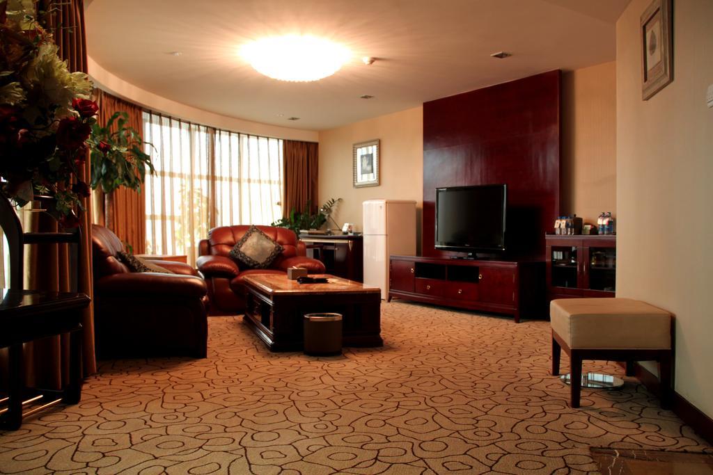 Dynasty International Hotel Kunming Oda fotoğraf
