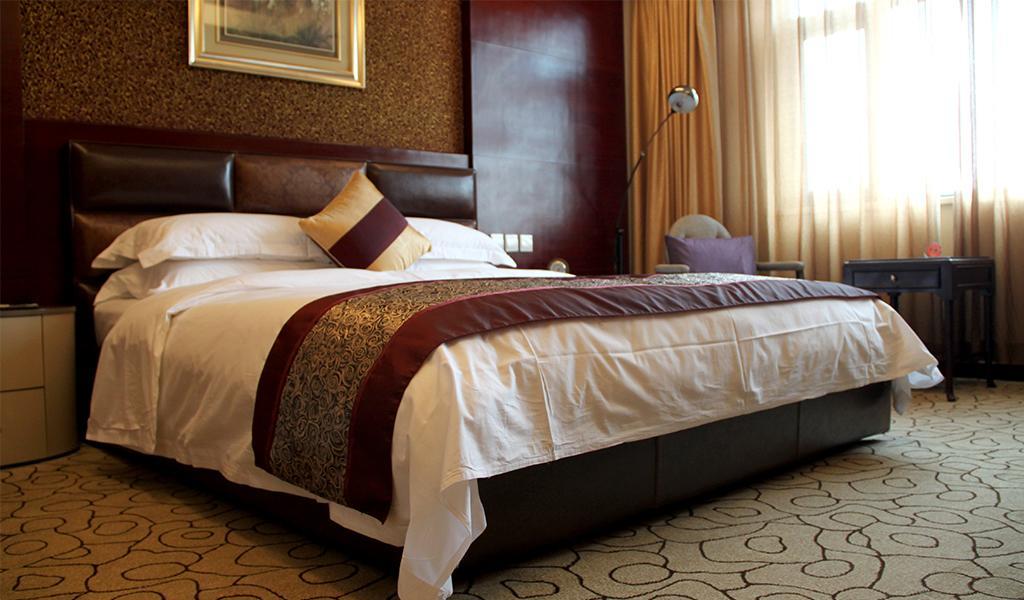 Dynasty International Hotel Kunming Oda fotoğraf