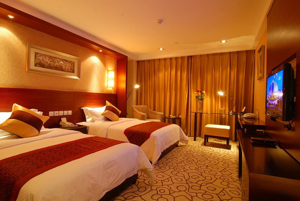 Dynasty International Hotel Kunming Oda fotoğraf